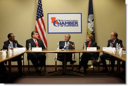 President George W. Bush gestures as he participates in a roundtable meeting on the economy with local business leaders from Alexandria, Louisiana Monday, Oct. 20, 2008, at the Central Louisiana Chamber of Commerce in Alexandria, Louisiana. The President delivered a statement on the Emergency Economic Stabilization Act and the Department of the Treasury's Troubled Asset Relief Plan. Joining the President from left to right, Martin Johnson, Lance Harris, Grace Allen, and Blake Chatelain. White House photo by Chris Greenberg