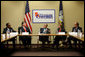 President George W. Bush gestures as he participates in a roundtable meeting on the economy with local business leaders from Alexandria, Louisiana Monday, Oct. 20, 2008, at the Central Louisiana Chamber of Commerce in Alexandria, Louisiana. The President delivered a statement on the Emergency Economic Stabilization Act and the Department of the Treasury's Troubled Asset Relief Plan. Joining the President from left to right, Martin Johnson, Lance Harris, Grace Allen, and Blake Chatelain. White House photo by Chris Greenberg