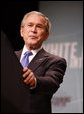 President George W. Bush delivers remarks at the White House Summit on International Development Tuesday, Oct. 21, 2008, in Washington, D.C. President Bush said in his remarks, "This is a summit to herald the outstanding work being done to lift up souls in need. I appreciate the fact that folks in this room represent thousands that are replacing disease with health, dependency with self-reliance, and despair with hope." White House photo by Eric Draper