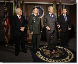 President George W. Bush delivers a statement to the press at the end of his visit Friday, Oct. 24, 2008, to the National Security Agency at Fort Meade, Md. With him are Vice President Dick Cheney, Lt. Gen. Keith B. Alexander, Director of the NSA, and Director of National Intelligence Mike McConnell. White House photo by Eric Draper