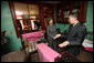 Mrs. Laura Bush visits the Lower East Side Tenement Museum in New York City, Friday, Oct 24, 2008. The tour is led by Mr. David Eng, the museum's Vice President of Public Affairs. The visit was to highlight the importance of historical preservation and celebrate the role immigration has played in America. White House photo by Chris Greenberg