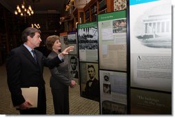 Mrs. Laura Bush is shown the "Abraham Lincoln: A Man of His Time, A Man for All Times' exhibition, Friday, Oct. 24, 2008 in New York City by Dr. James Basker, President of the Gilder Lehrman Institute of American History. The tour at the Lincoln Room of Union League Club in New York City was immediately prior to the Fifth Annual Preserve America History Teacher of the Year Award ceremony.  White House photo by Chris Greenberg