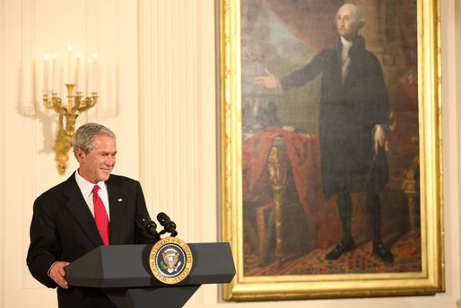 President George W. Bush welcomes guests Monday evening, Oct. 27, 2008 to the East Wing of the White House, to celebrate the 150th birthday and contributions of Theodore Roosevelt, the 26th President of the United States. White House photo by Chris Greenberg