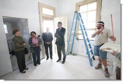 Mrs. Laura Bush is joined by homeowner Joretta Roman as she views the renovation project at Roman's home Thursday, October 30, 2008, in New Orleans, La., during a tour of the home being rennovated by Catholic Charities Operation Helping Hands. The home sustained damage during Hurricane Katrina. White House photo by Chris Greenberg