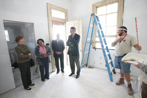 Mrs. Laura Bush is joined by homeowner Joretta Roman as she views the renovation project at Roman's home Thursday, October 30, 2008, in New Orleans, La., during a tour of the home being rennovated by Catholic Charities Operation Helping Hands. The home sustained damage during Hurricane Katrina. White House photo by Chris Greenberg