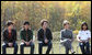 Mrs. Laura Bush is joined onstage by Boys and Girls Club student Jovanna Moreno age 11, right, and singer/songwriters the Jonas Brothers, Nick Jonas age 16, left, Joe Jonas age 19, 2nd from left, and Kevin Jonas age 20, 3rd left during a First Bloom event at the Trinity River Audubon Center, Sunday, November 2, 2008, in Dallas, TX. White House photo by Chris Greenberg