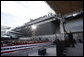 President George W. Bush gestures as he addresses his remarks in honor of Veteran's Day Tuesday, Nov. 11, 2008, at the rededication ceremony of the Intrepid Sea, Air and Space Museum in New York. White House photo by Eric Draper