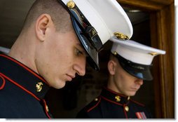 U.S. Marine Corps members listen as Vice President Dick Cheney delivers remarks Tuesday, Nov. 11, 2008 during the 55th Annual National Veterans Day Observance at Arlington National Cemetery in Arlington, Va. “To honor our veterans, we must keep the promises we have made to them,” asserted Vice President Cheney, “we must care for those who have been injured in the service of our country. We must honor and remember those who have died. And we must remember those whose fate is still undetermined.”  White House photo by David Bohrer