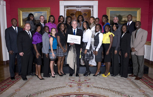 President George W. Bush poses with members of the Louisiana State University Women's Outdoor Track and Field Team Wednesday, Nov. 12, 2008, during a photo opportunity with 2008 NCAA Sports Champions at the White House. White House photo by Chris Greenberg