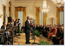 Mrs. Laura Bush listens as Berklee City Music group performs Friday, Nov. 14, 2008, during the Coming Up Taller Awards in the East Room of the White House. White House photo by Joyce N. Boghosian