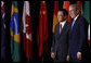 President George W. Bush welcomes Prime Minister Taro Aso of Japan, to the Summit on Financial Markets and the World Economy Saturday, Nov. 15, 2008, at the National Building Museum in Washington, D.C. White House photo by Eric Draper