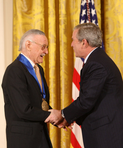 President George W. Bush congratulates legendary comic book creator Stan Lee of Los Angeles, as a recipient of the 2008 National Medal of Arts in ceremonies Monday, Nov. 17, 2008 at the White House. White House photo by Chris Greenberg