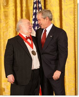 President George W. Bush congratulates Myron Magnet, editor of the City Journal of New York, as a recipient of the 2008 National Humanities Medal in ceremonies Monday, Nov. 17, 2008 at the White House. White House photo by Chris Greenberg