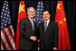 President George W. Bush participates in a greeting with Hu Jintao, President of the People's Republic of China, prior to the start of their meeting Friday, Nov. 21, 2008 in Lima, Peru. President Bush is in Lima to attend the APEC Peru 2008 summit. White House photo by Chris Greenberg