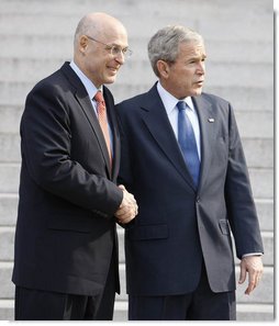 President George W. Bush and Secretary Henry Paulson of the U.S. Department of Treasury, pause for questions after their meeting Monday, Nov. 24, 2008, at the Treasury Department. Said the President, "Secretary Paulson is working closely with the President-elect's transition team. It's important for the American people to know that there is close cooperation. It's important for the American people to know that we will safeguard the financial system as the first step necessary for financial -- or for economic recovery. And so, Mr. Secretary, thanks for your hard work." White House photo by Eric Draper