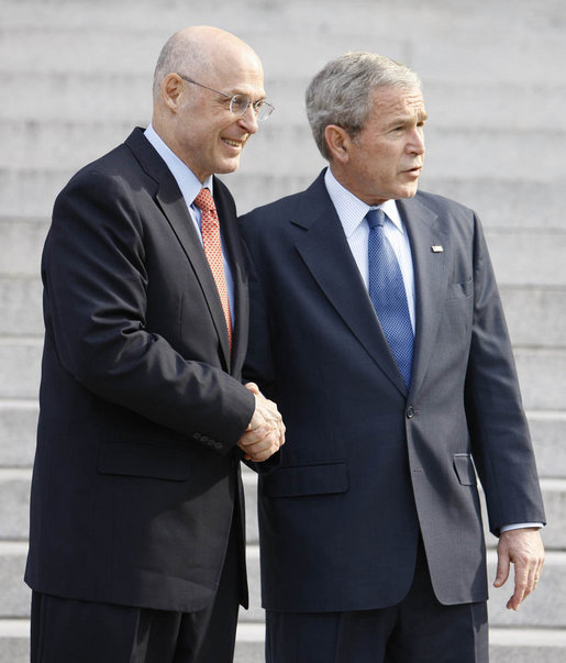 President George W. Bush and Secretary Henry Paulson of the U.S. Department of Treasury, pause for questions after their meeting Monday, Nov. 24, 2008, at the Treasury Department. Said the President, "Secretary Paulson is working closely with the President-elect's transition team. It's important for the American people to know that there is close cooperation. It's important for the American people to know that we will safeguard the financial system as the first step necessary for financial -- or for economic recovery. And so, Mr. Secretary, thanks for your hard work." White House photo by Eric Draper