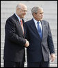 President George W. Bush and Secretary Henry Paulson of the U.S. Department of Treasury, pause for questions after their meeting Monday, Nov. 24, 2008, at the Treasury Department. Said the President, "Secretary Paulson is working closely with the President-elect's transition team. It's important for the American people to know that there is close cooperation. It's important for the American people to know that we will safeguard the financial system as the first step necessary for financial -- or for economic recovery. And so, Mr. Secretary, thanks for your hard work." White House photo by Eric Draper