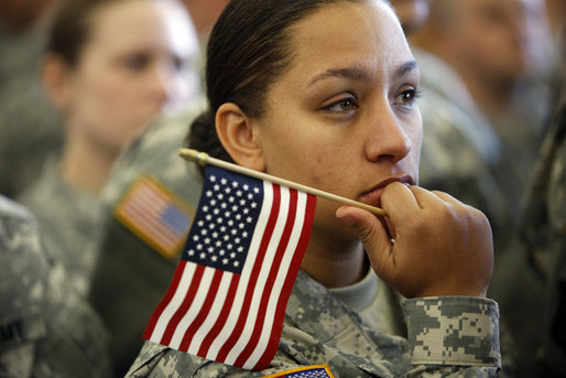 A soldier listens to President George W. Bush as he addresses an estimated audience of 7,500 military personnel, family members of soldiers and wounded warriors Tuesday, Nov. 25, 2008, at Fort Campbell, Ky. White House photo by Eric Draper