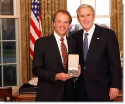 President George W. Bush stands with Ward Brehm after presenting him with the 2008 Presidential Citizens Medal Wednesday, Dec. 10, 2008, in the Oval Office of the White House. White House photo by Chris Greenberg