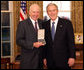 President George W. Bush stands with Sam Heyman after presenting him with the 2008 Presidential Citizens Medal Wednesday, Dec. 10, 2008, in the Oval Office of the White House. White House photo by Chris Greenberg