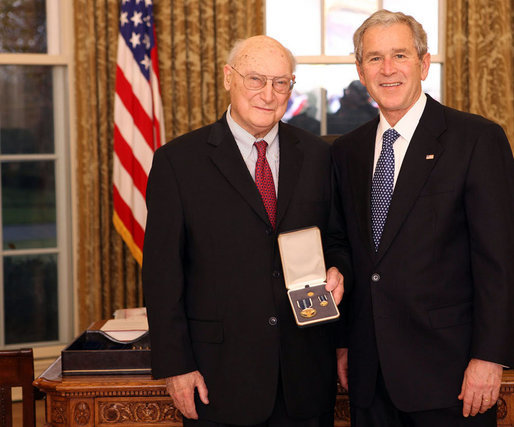 President George W. Bush stands with Andrew Marshall after presenting him with the 2008 Presidential Citizens Medal Wednesday, Dec. 10, 2008, in the Oval Office of the White House. White House photo by Chris Greenberg