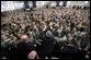 President George W. Bush reaches to shake as many hands as possible as he meets with U.S. military and diplomatic personnel Sunday, Dec, 14, 2008, at the Al Faw Palace-Camp Victory in Baghdad. White House photo by Eric Draper