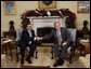 President George W. Bush and President Antonio Saca of El Salvador shake hands as they meet Tuesday, Dec. 16, 2008, in the Oval Office of the White House. White House photo by Eric Draper