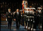 President George W. Bush reviews the troops at Ft. Myer in Arlington, Va., Tuesday, Jan. 6, 2009, during a military appreciation in his honor. With him is Col. Joseph Buche, Commander of Troops. White House photo by Joyce N. Boghosian