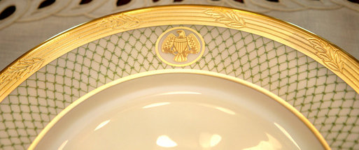 The rim of the George W. Bush State China, unveiled Wednesday, Jan. 7, 2009, at the White House by Mrs. Laura Bush, shows the two distinctive design elements of the china – a green basket-weave pattern and a historically-inspired gold eagle – throughout the 14-piece place setting. The new 320-place setting china will allow the White House to accommodate larger Rose Garden dinners and cover any breakage. The china was paid for by the White House Historical Association Acquisition Trust, a non-profit organization. White House photo by Shealah Craighead