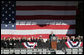 President George W. Bush addresses his remarks in honor of his father, former President George H. W. Bush, at the commissioning ceremony of the USS George H. W. Bush (CVN 77) aircraft carrier Saturday, Jan 10, 2009 in Norfolk, Va. White House photo by Joyce N. Boghosian