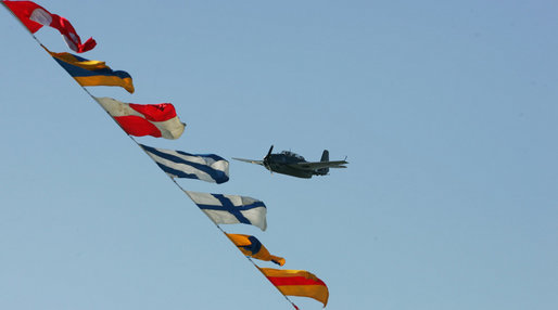 A World War II Avenger Torpedo bomber similar to the plane flown by former President George H.W. Bush does a flyby Saturday, Jan. 10, 2009, during commissioning ceremonies of the USS George H. W. Bush (CVN 77) aircraft carrier in Norfolk, Va. White House photo by Joyce N. Boghosian