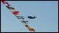 A World War II Avenger Torpedo bomber similar to the plane flown by former President George H.W. Bush does a flyby Saturday, Jan. 10, 2009, during commissioning ceremonies of the USS George H. W. Bush (CVN 77) aircraft carrier in Norfolk, Va. White House photo by Joyce N. Boghosian