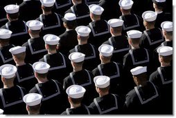 U.S. Navy Sailors stand at attention Saturday, Jan. 10, 2009, during commissioning ceremonies for the USS George H.W. Bush (CVN 77) aircraft carrier in Norfolk, Va. White House photo by David Bohrer