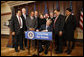 President George W. Bush signs one of three proclamations designating new Marine National Monuments in the Pacific during an event Tuesday, January 6, 2009, in the Eisenhower Executive Office Building. Joining in the signing ceremony were Mrs. Laura Bush, EPA Administrator Stephen Johnson, Interior Secretary Dirk Kempthorne, Commerce Secretary Carlos Gutierrez, Secretary Don Winter, Department of the Navy; Admiral Gary Roughead, Chief of Naval Operations; Bill Brennan, Administrator, National Oceanic and Atmospheric Administration, Department of Commerce; Governor Benigno Fitial, Northern Mariana Islands; Lelei Peau, Deputy Director, American Samoa Department of Commerce; Ray Tulafono, Director, American Samoa Department of Marine and Wildlife Resources; and Jim Connaughton, Chairman, Council of Environmental Quality. White House photo by Chris Greenberg