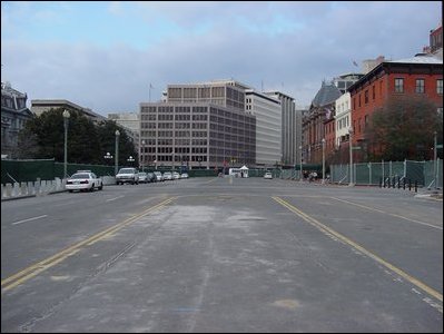 West view with construction fence surrounding the project area