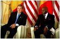 President George W. Bush meets with President Abdoulaye Wade of Senegal at the Presidential Palace in Dakar, Senegal, Tuesday morning, July 8, 2003. 