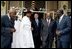 President George W. Bush departs a meeting with leaders of Western African democracies at the Presidential Palace in Dakar, Senegal, Tuesday morning, July 8, 2003. Leaders present in the meeting were from Benin, Cape Verde, Gambia, Ghana, Mali, Niger, Senegal and Sierra Leone. 