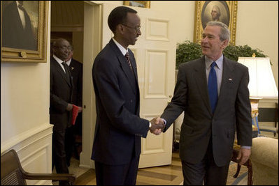 President George W. Bush meets with the President Paul Kagame of Rwanda in the Oval Office Friday, April 15, 2005.