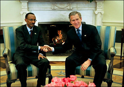 President George W. Bush meets with President Paul Kagame of Rwanda in the Oval Office Tuesday, March 4, 2003. 