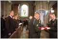 President Bush attends a Memorial Day service at the Saint Marie Eglise Church in Saint Marie Eglise, near Normandy, France, May 27.