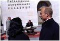 President Bush signs a guest book during his visit to the Piskarevskoye Cemetery in St. Petersburg, May 25. 