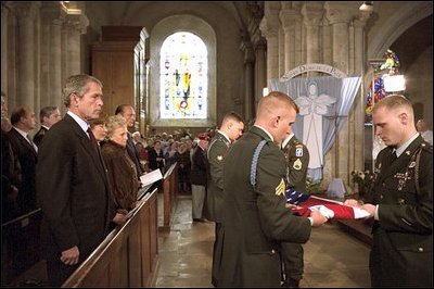 President Bush attends a Memorial Day service at the Saint Marie Eglise Church in Saint Marie Eglise, near Normandy, France, May 27. "We have gathered on this quiet corner of France as the sun rises on Memorial Day in the United States of America, said the President during a visit to a nearby American cemetery in Colleville-Sur-Mer, France. "This is a day our country has set apart to remember what was gained in our wars, and all that was lost."