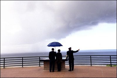 President Bush and Mrs. Bush remember the D-Day Invasion during a visit to Omaha Beach at Normandy, France, May 27. More than 5,000 ships and 12,000 planes carried troops into battle in which more than 9,000 American soldiers died.