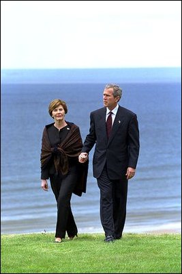 President Bush and Mrs. Bush take a walking tour of Omaha Beach at Normandy, France, May 27.