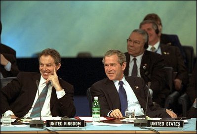 President Bush and Prime Minister Tony Blair attend the opening session of a NATO summit in Rome May 28. The President discussed the formation of a council relationship between Russia and NATO. "The NATO-Russia Council offers Russia a path toward forming an alliance with the alliance," said President Bush. "It offers all our nations a way to strengthen our common security, and it offers the world a prospect of a more hopeful century."