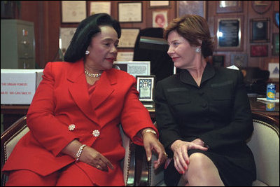 Laura Bush speaks with Coretta Scott King during a Jan. 21, 2002 visit to the Ebenezer Baptist Church in Atlanta, Ga.