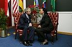 President George W. Bush speaks with Coretta Scott King at the King Center in Atlanta, Georgia, Jan. 15, 2004.