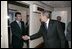 President George W. Bush welcomes Prime Minister Anders Fogh Rasmussen aboard Air Force One after arriving in Kastrup, Denmark, Tuesday, July 5, 2005.