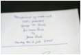 The signatures of President Bush and Laura Bush are written in the guest book at Prime Minister Anders Fogh Rasmussen's summer residence in Marienborg in Kongens Lyngby, Denmark, Wednesday, July 6, 2005.