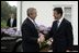 President George W. Bush is greeted by Danish Prime Minister Anders Fogh Rasmussen at his summer residence in Marienborg in Kongens Lyngby, Denmark, Wednesday, July 6, 2005.